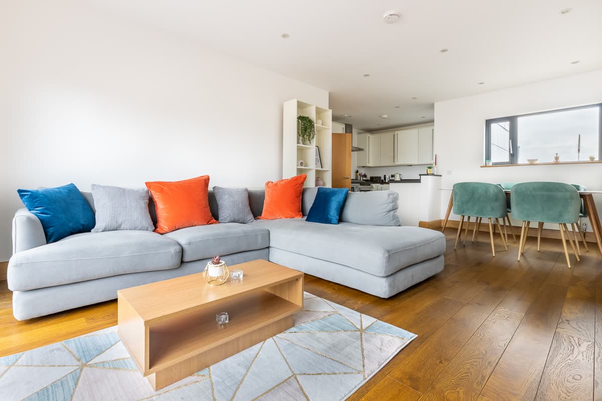 Open-plan living and dining space in an apartment we operate